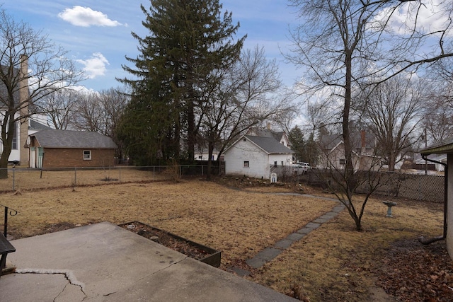 view of yard featuring a patio area and a fenced backyard