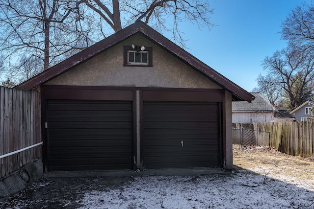 detached garage with fence