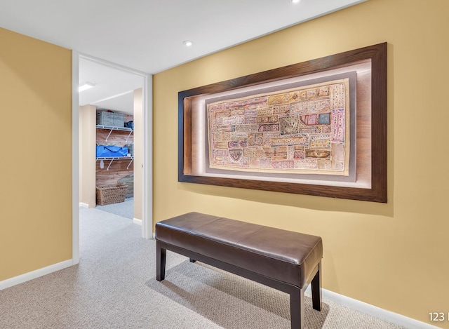 hallway featuring carpet floors, recessed lighting, and baseboards