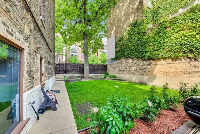 view of yard featuring fence