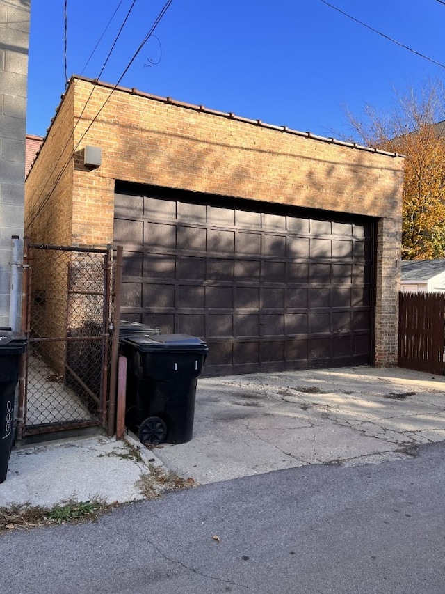 detached garage with fence