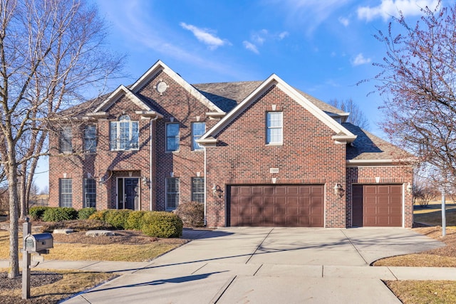 view of front facade featuring roof with shingles, concrete driveway, and brick siding