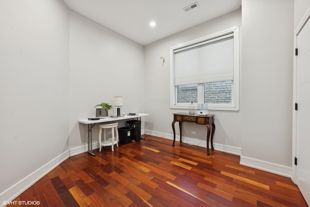 office featuring baseboards, visible vents, wood finished floors, and recessed lighting