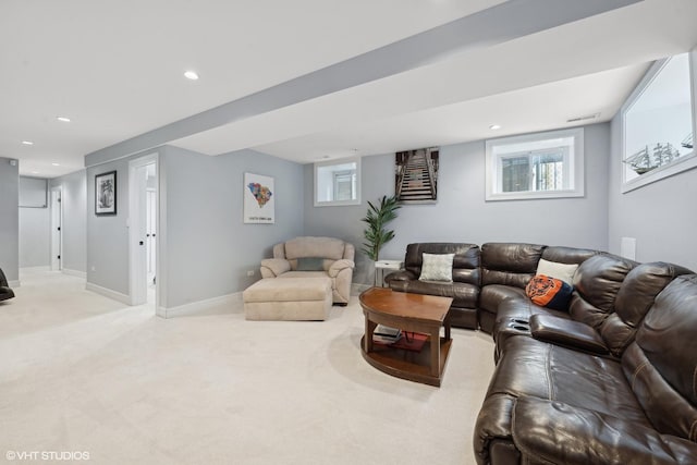 living room featuring recessed lighting, carpet floors, visible vents, baseboards, and a healthy amount of sunlight