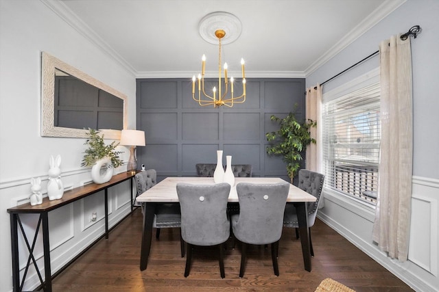 dining space featuring crown molding, a notable chandelier, and a decorative wall