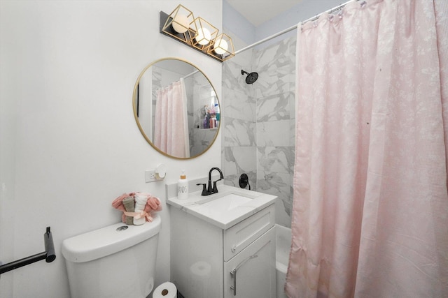 bathroom featuring toilet, shower / bath combo, and vanity