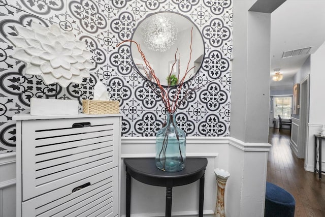 bathroom with visible vents and hardwood / wood-style flooring