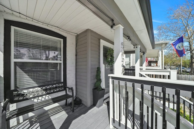 wooden deck featuring a porch