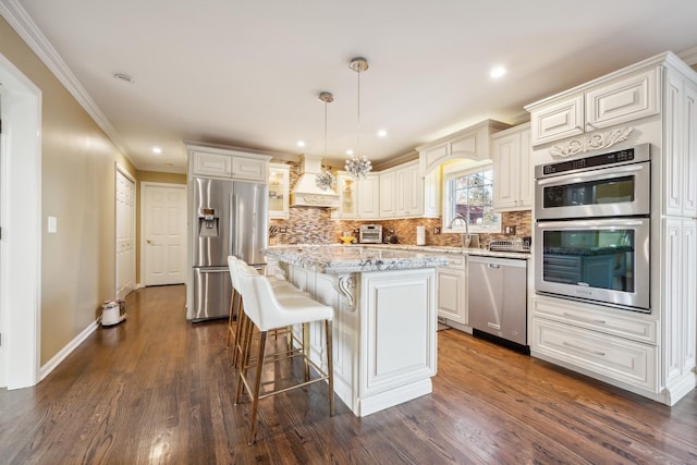 kitchen featuring dark wood-type flooring, a kitchen breakfast bar, appliances with stainless steel finishes, tasteful backsplash, and custom range hood