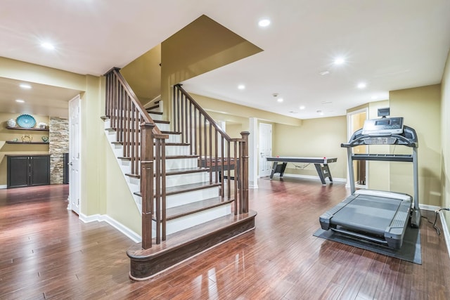 workout room with recessed lighting, pool table, baseboards, and wood finished floors