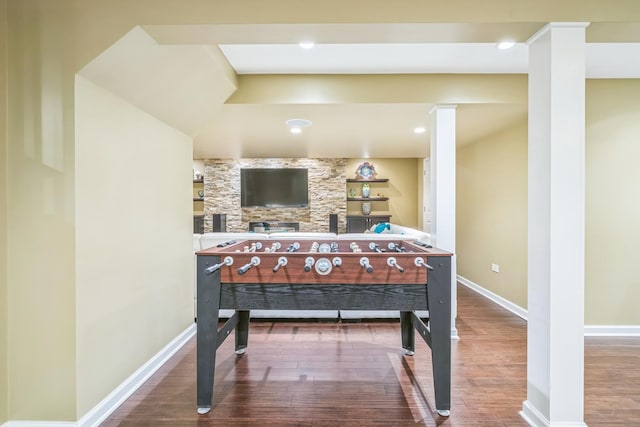 recreation room featuring recessed lighting, wood finished floors, and baseboards