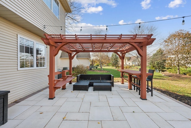 view of patio / terrace featuring an outdoor living space and a pergola