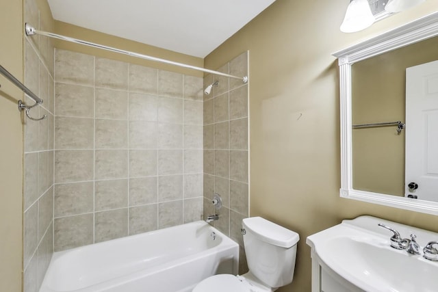 full bathroom featuring toilet, bathtub / shower combination, and vanity