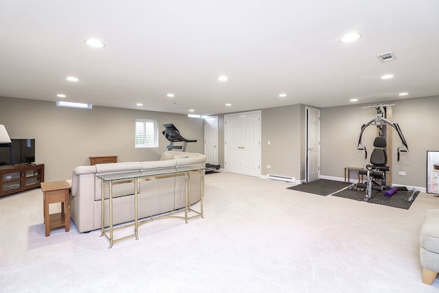 interior space featuring visible vents, baseboards, light carpet, baseboard heating, and recessed lighting