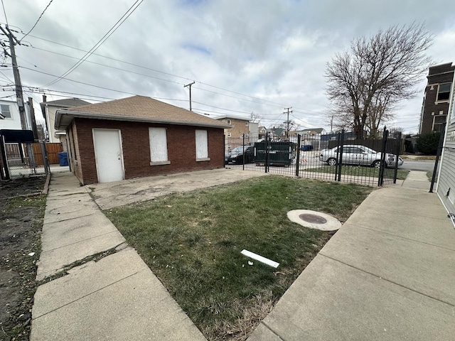 exterior space with fence and a gate