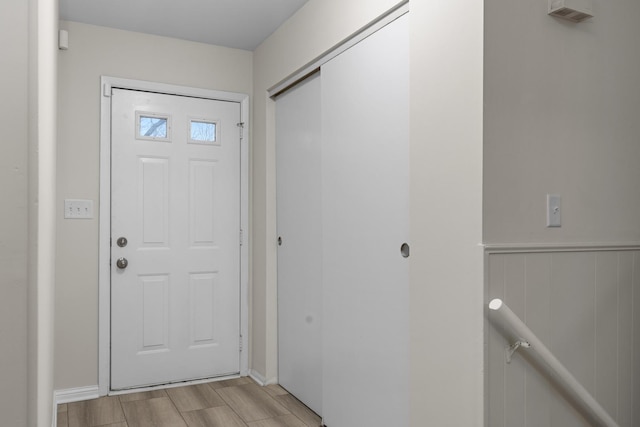 foyer with wood tiled floor