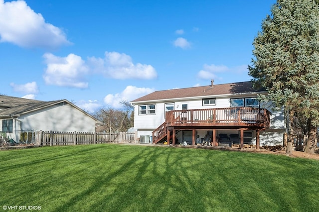 back of house with cooling unit, fence, stairway, a lawn, and a wooden deck