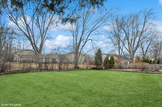 view of yard featuring fence