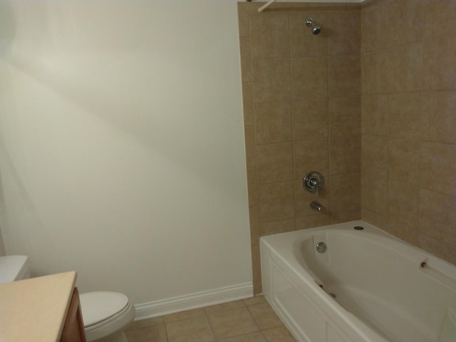 full bathroom with tile patterned flooring, baseboards, washtub / shower combination, toilet, and vanity