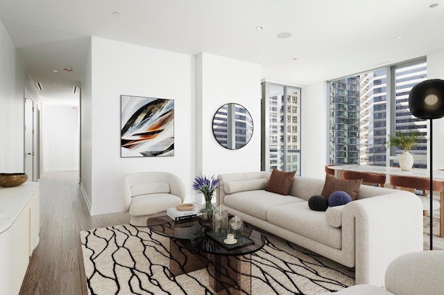 living area with baseboards and light wood-style floors