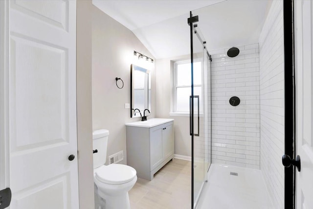 full bath with toilet, vanity, visible vents, vaulted ceiling, and a shower stall