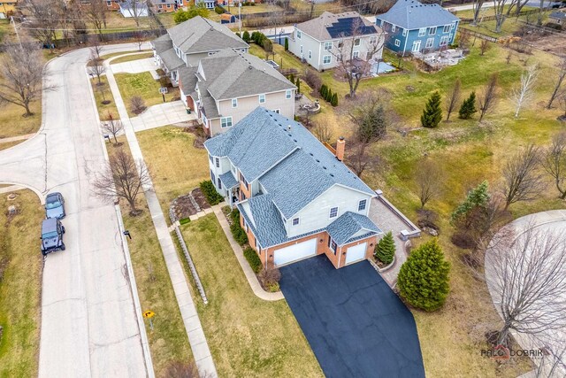 drone / aerial view with a residential view