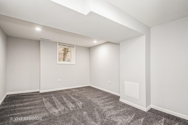 basement with carpet floors, baseboards, and recessed lighting