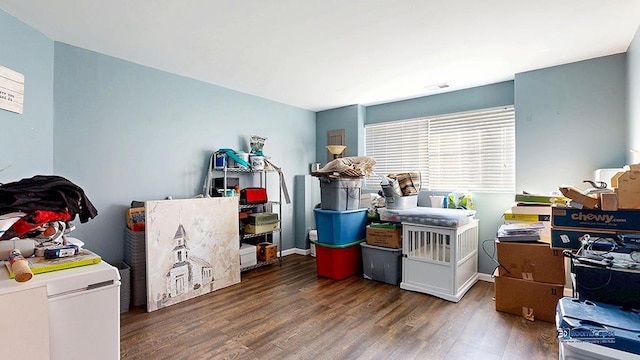 miscellaneous room with wood finished floors