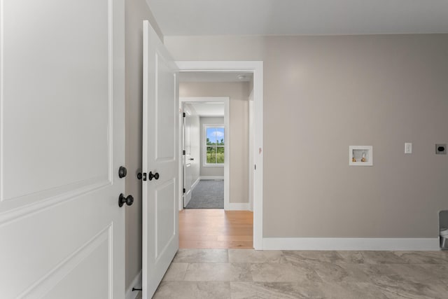 laundry area with electric dryer hookup, baseboards, hookup for a washing machine, and laundry area