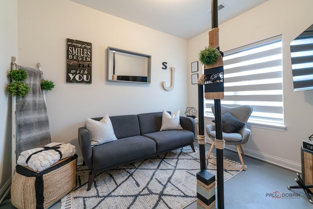 living room featuring visible vents and baseboards