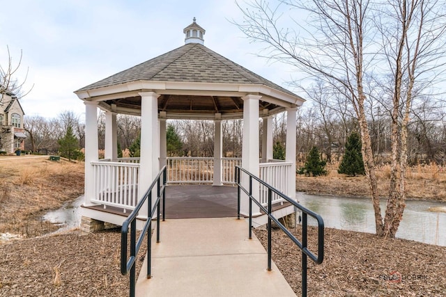 view of home's community featuring a gazebo and a water view