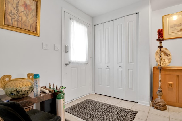 foyer entrance featuring light tile patterned floors