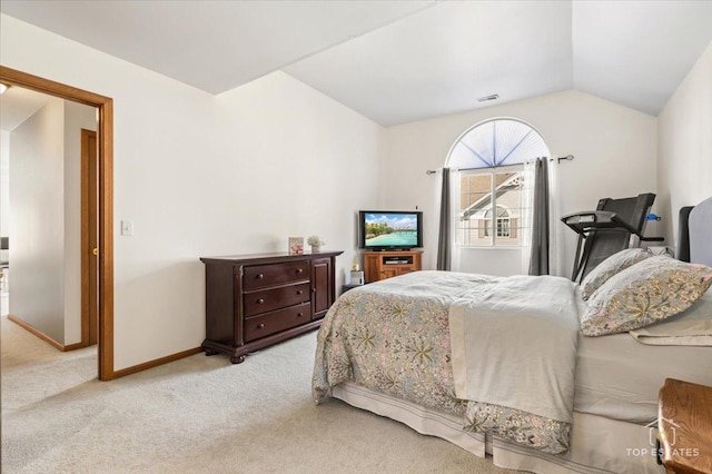 bedroom featuring lofted ceiling, carpet, and baseboards