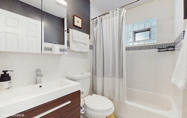 full bath featuring vanity, decorative backsplash, tile walls, toilet, and shower / tub combo with curtain