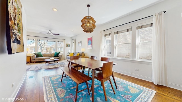 dining space with hardwood / wood-style floors, visible vents, recessed lighting, and baseboards