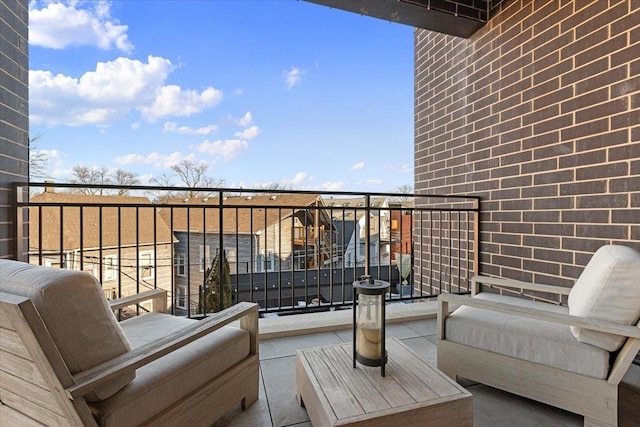 balcony featuring a residential view