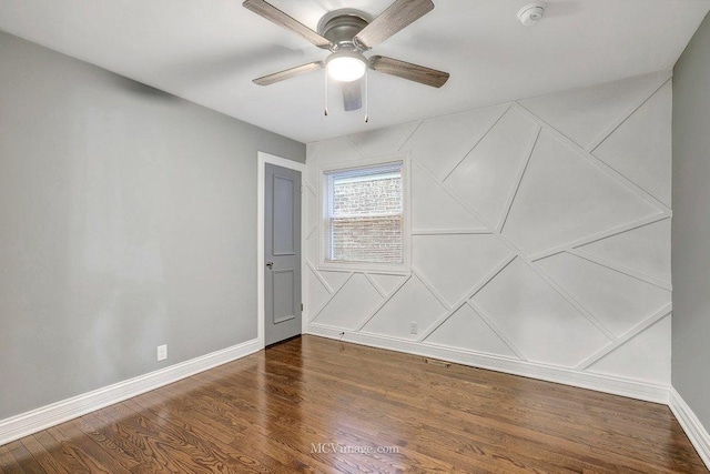 unfurnished room with ceiling fan, baseboards, and wood finished floors