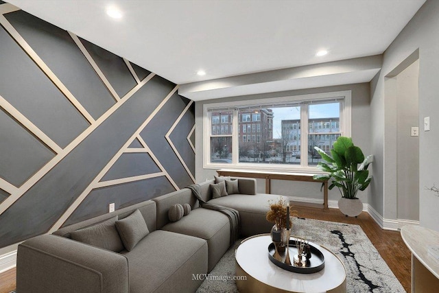 living area featuring dark wood-style floors, a view of city, baseboards, and recessed lighting