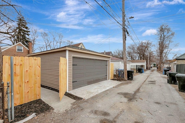 detached garage with fence