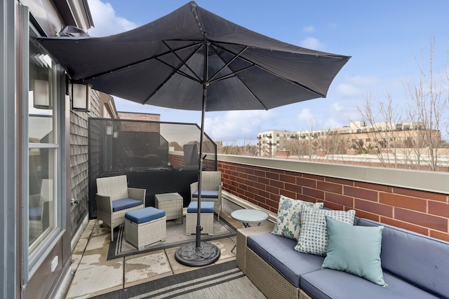 view of patio / terrace with outdoor lounge area and a balcony