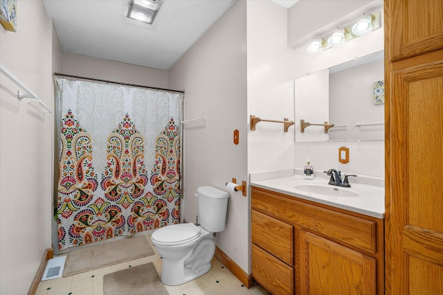 bathroom with baseboards, visible vents, toilet, a shower with curtain, and vanity