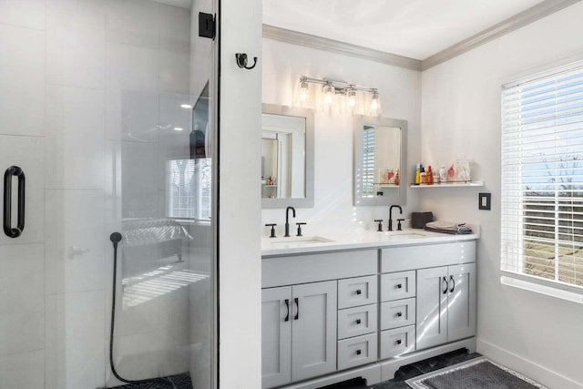 bathroom with crown molding, a sink, a shower stall, and double vanity