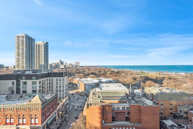 property's view of city with a water view