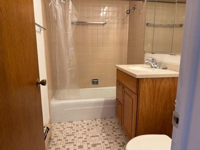 full bathroom with toilet, shower / tub combo, a baseboard radiator, and vanity