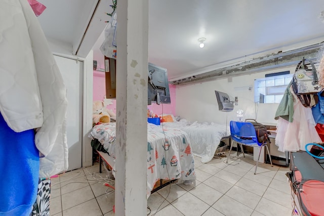 bedroom with tile patterned floors