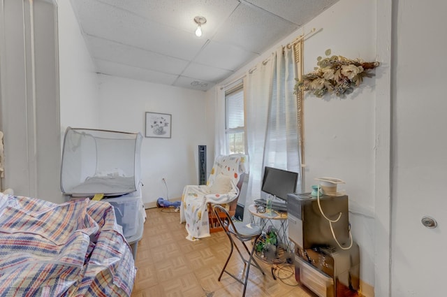 bedroom with a drop ceiling