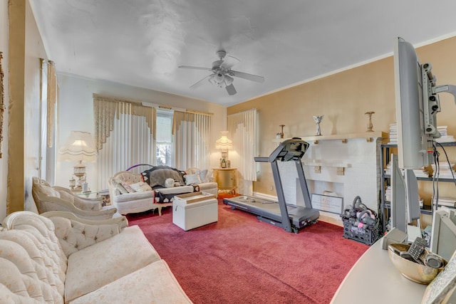 workout area featuring a ceiling fan, carpet flooring, and crown molding