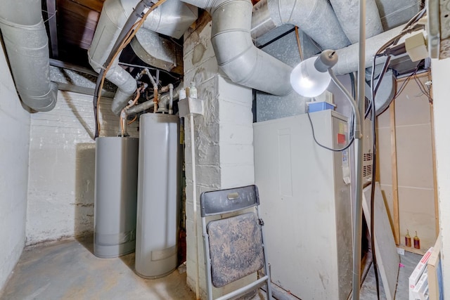 utility room featuring gas water heater