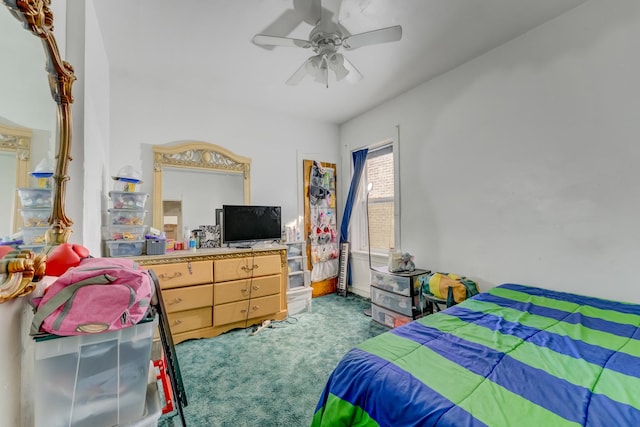 carpeted bedroom with ceiling fan