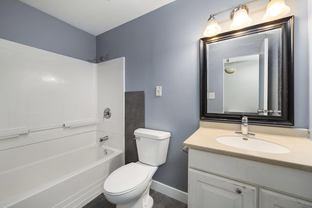 bathroom with baseboards, shower / bath combination, vanity, and toilet